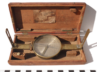 Surveyor's vained compass with thrashed box.