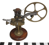 Articulated watch maker's cutting engine.  